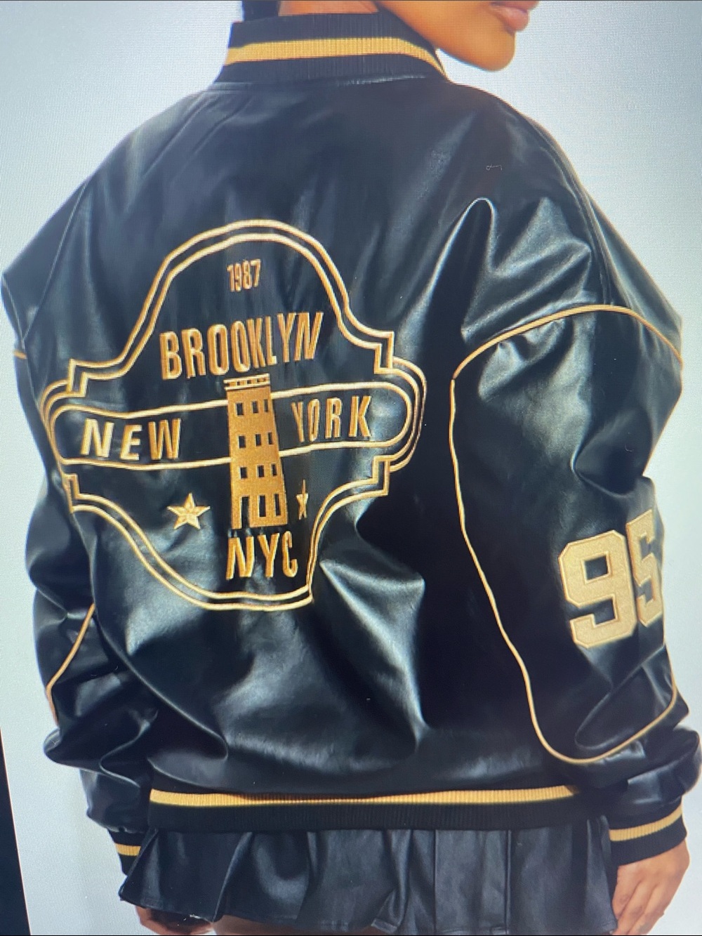 NWT Fashion Nova Black Varsity Faux Leather Jacket with Gold Trim